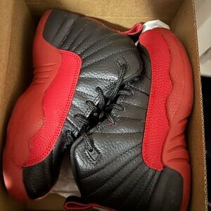 Black and red Jordan 12s